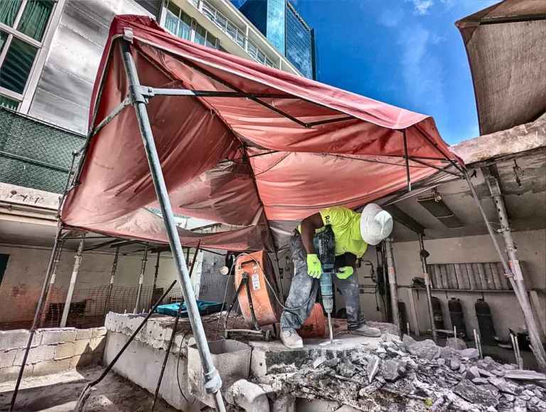 How to handle the removal and disposal of concrete debris after a demolition process
