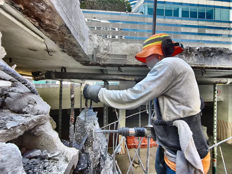 How to minimize dust and debris during a residential concrete demolition