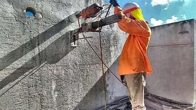 Core drilling on hotel roof