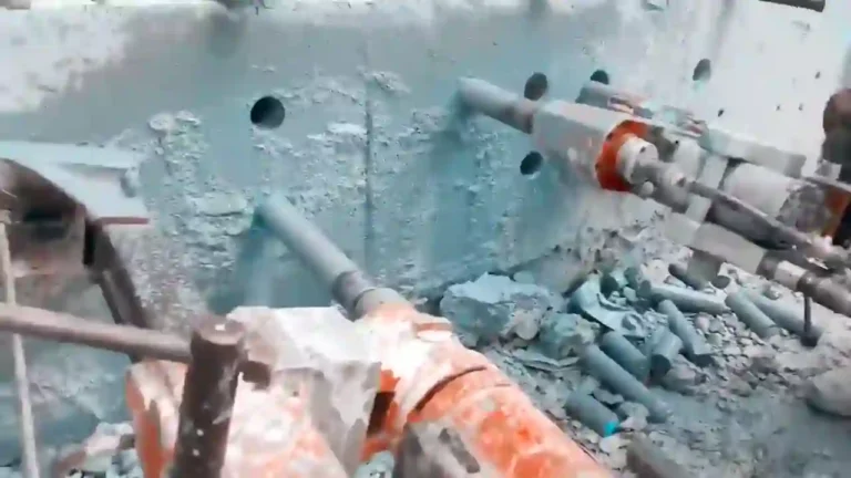 breaking up concrete with a cold chisel 32