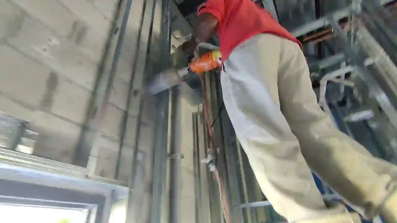 Slab sawing in progress along a marked line