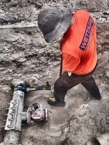 tapping the water pipe