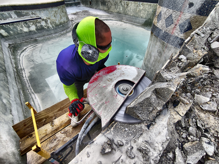 Ray cutting up a pool with the Hand Saw