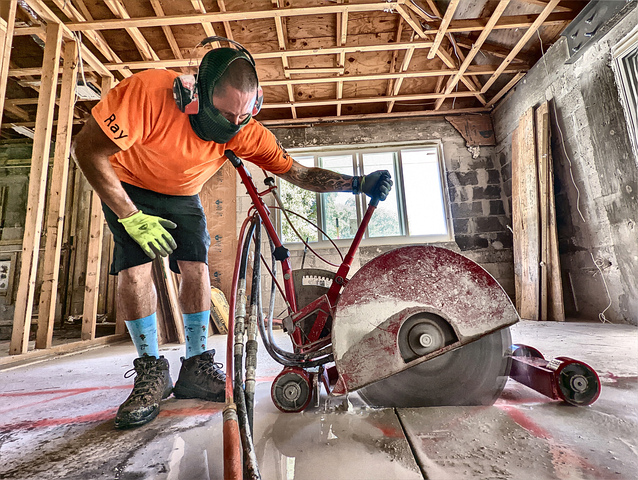 Slab Sawing a plumbers trench for in a house